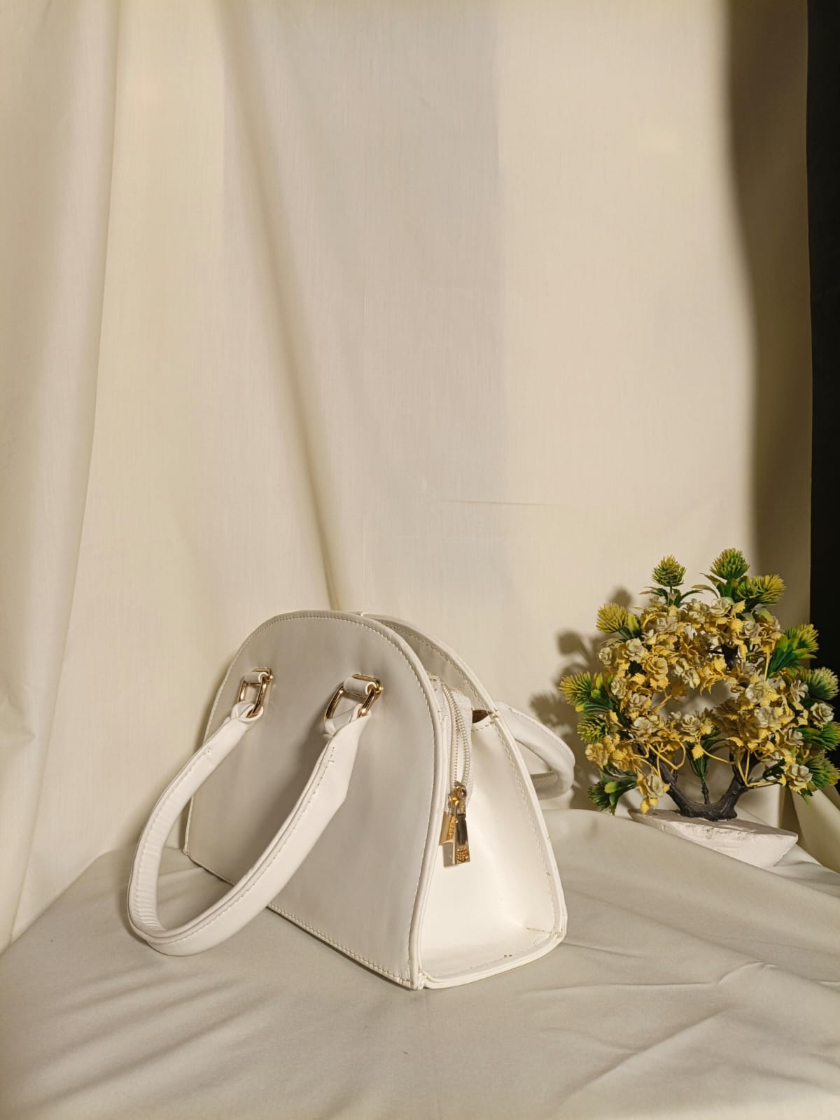 Elegant Ivory Dome Handbag with Gold-Tone Hardware